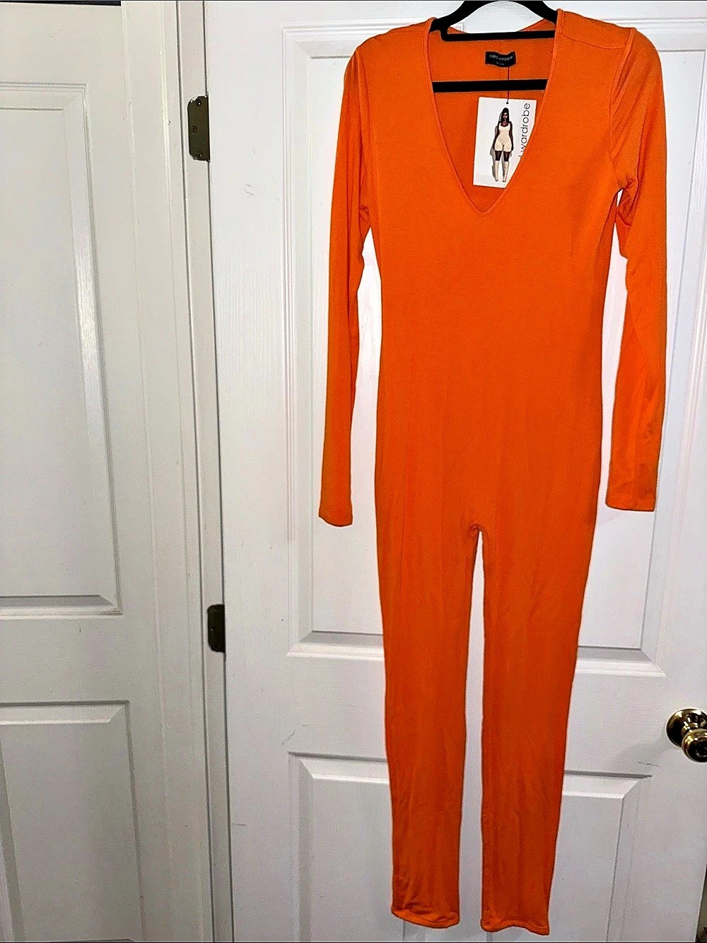 Naked Wardrobe  Orange Long Sleeve Jumpsuit NWT